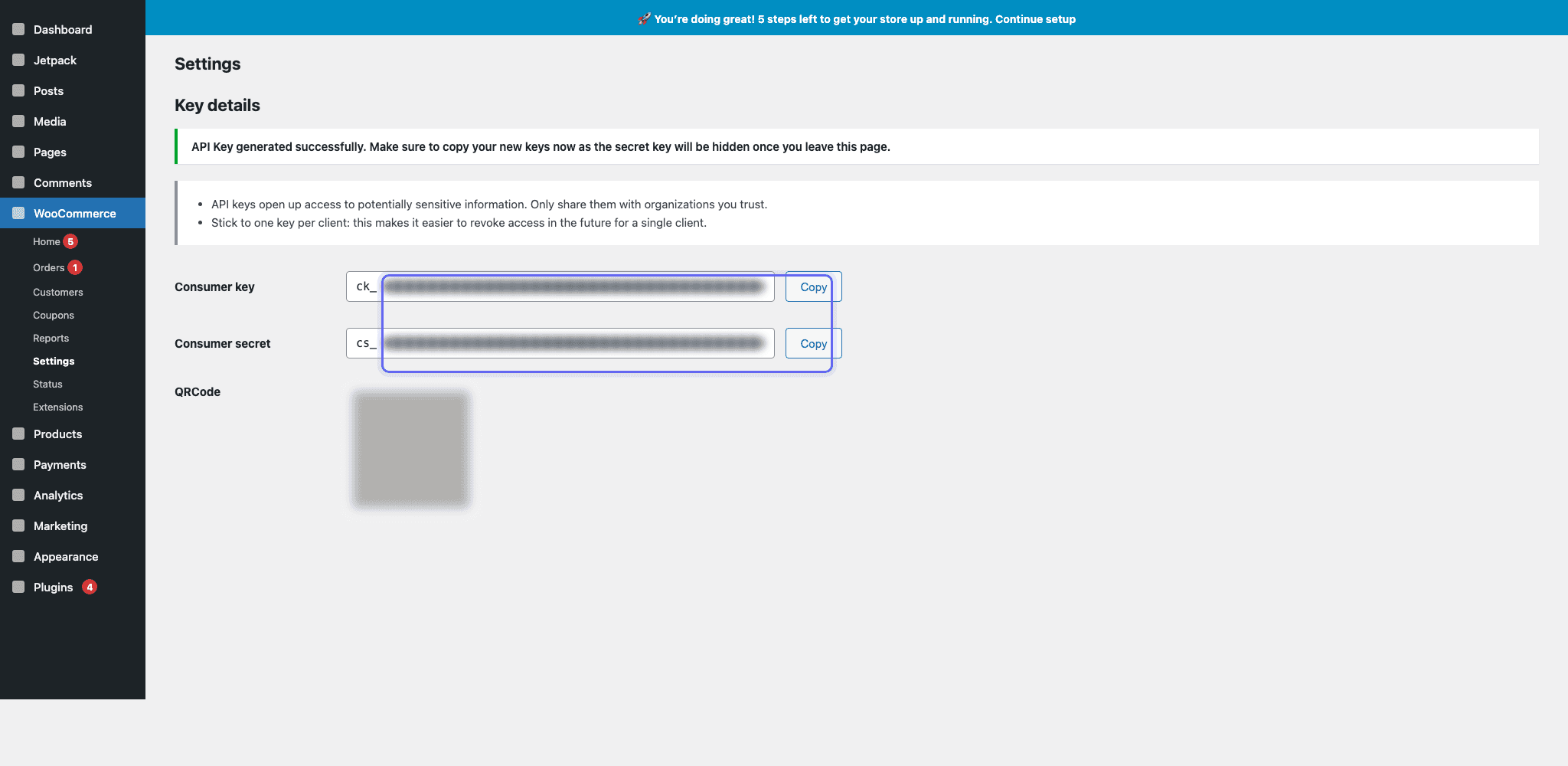 WooCommerce API key details screen with the consumer key and secret blurred